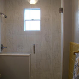 Bathroom with tiled walk-in shower